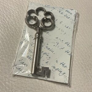 Michaels Silver Metal Key Large NWT sealed in package.